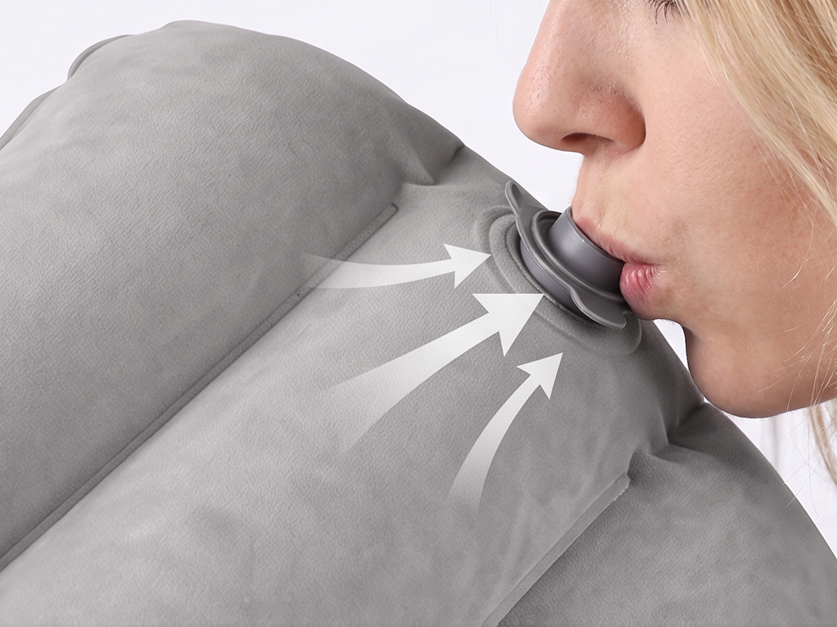 Inflate the travel pillow